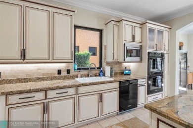 Exquisite 2-story pool home w/serene lake views in the on Parkland Golf Club in Florida - for sale on GolfHomes.com, golf home, golf lot