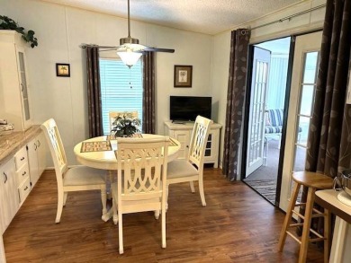 Discover this beautiful turnkey 2-bedroom, 2-bathroom home on Crystal Lake Club in Florida - for sale on GolfHomes.com, golf home, golf lot