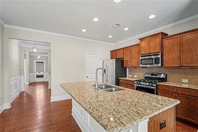 Hidden at the end of a quiet cul-de-sac in Heron Bay Villas on Canongate At Heron Bay in Georgia - for sale on GolfHomes.com, golf home, golf lot