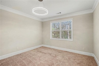 Hidden at the end of a quiet cul-de-sac in Heron Bay Villas on Canongate At Heron Bay in Georgia - for sale on GolfHomes.com, golf home, golf lot