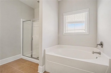 Hidden at the end of a quiet cul-de-sac in Heron Bay Villas on Canongate At Heron Bay in Georgia - for sale on GolfHomes.com, golf home, golf lot