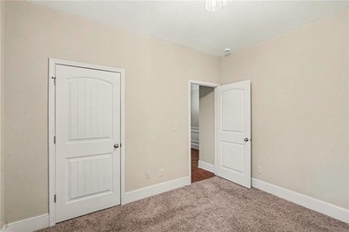 Hidden at the end of a quiet cul-de-sac in Heron Bay Villas on Canongate At Heron Bay in Georgia - for sale on GolfHomes.com, golf home, golf lot