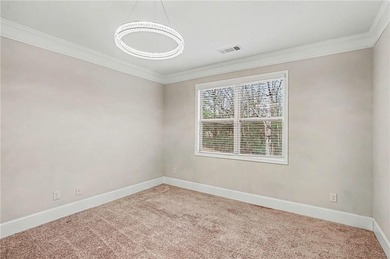 Hidden at the end of a quiet cul-de-sac in Heron Bay Villas on Canongate At Heron Bay in Georgia - for sale on GolfHomes.com, golf home, golf lot