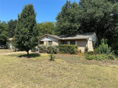 This home, owned and occupied by the same family since the on Dallas National Golf Club in Texas - for sale on GolfHomes.com, golf home, golf lot