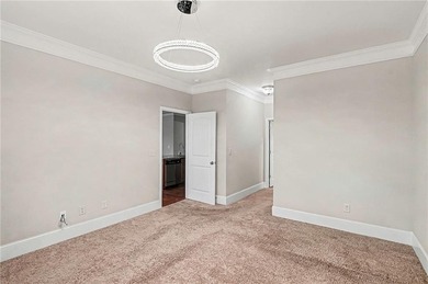 Hidden at the end of a quiet cul-de-sac in Heron Bay Villas on Canongate At Heron Bay in Georgia - for sale on GolfHomes.com, golf home, golf lot