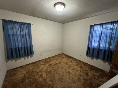 This home, owned and occupied by the same family since the on Dallas National Golf Club in Texas - for sale on GolfHomes.com, golf home, golf lot