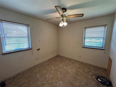 This home, owned and occupied by the same family since the on Dallas National Golf Club in Texas - for sale on GolfHomes.com, golf home, golf lot