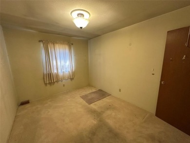 This home, owned and occupied by the same family since the on Dallas National Golf Club in Texas - for sale on GolfHomes.com, golf home, golf lot