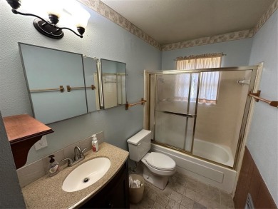 This home, owned and occupied by the same family since the on Dallas National Golf Club in Texas - for sale on GolfHomes.com, golf home, golf lot