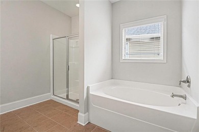 Hidden at the end of a quiet cul-de-sac in Heron Bay Villas on Canongate At Heron Bay in Georgia - for sale on GolfHomes.com, golf home, golf lot