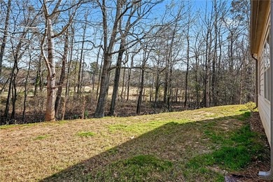 Hidden at the end of a quiet cul-de-sac in Heron Bay Villas on Canongate At Heron Bay in Georgia - for sale on GolfHomes.com, golf home, golf lot