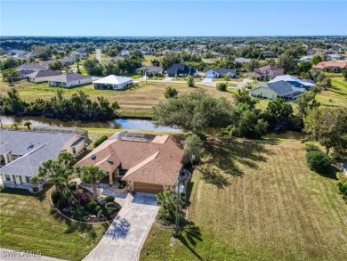 Don't Miss this Wonderful, Canal Front, 3bed/2bath/Open Split on Kingsway Country Club in Florida - for sale on GolfHomes.com, golf home, golf lot