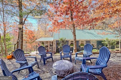 Charming Lake Burton Cottage with Deeded Lake Access - Under on Waterfall Country Club in Georgia - for sale on GolfHomes.com, golf home, golf lot