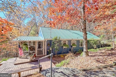 Charming Lake Burton Cottage with Deeded Lake Access - Under on Waterfall Country Club in Georgia - for sale on GolfHomes.com, golf home, golf lot