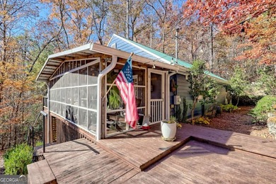 Charming Lake Burton Cottage with Deeded Lake Access - Under on Waterfall Country Club in Georgia - for sale on GolfHomes.com, golf home, golf lot