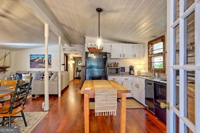 Charming Lake Burton Cottage with Deeded Lake Access - Under on Waterfall Country Club in Georgia - for sale on GolfHomes.com, golf home, golf lot