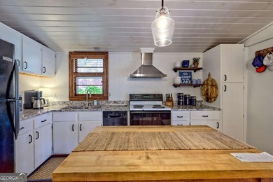 Charming Lake Burton Cottage with Deeded Lake Access - Under on Waterfall Country Club in Georgia - for sale on GolfHomes.com, golf home, golf lot