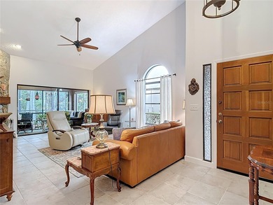 Palm Harbor - Nestled in the gated community of Wescott Square on Tarpon Woods Golf Club in Florida - for sale on GolfHomes.com, golf home, golf lot