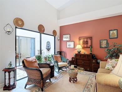 Palm Harbor - Nestled in the gated community of Wescott Square on Tarpon Woods Golf Club in Florida - for sale on GolfHomes.com, golf home, golf lot