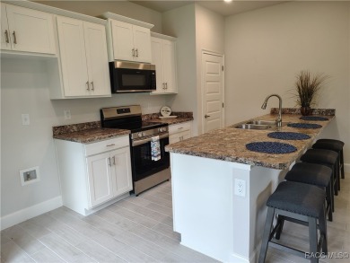 THE SANDHILL TOWNHOUSE - YEARLY BLOWOUT SALES, LOWEST INTEREST on Inverness Golf and Country Club in Florida - for sale on GolfHomes.com, golf home, golf lot