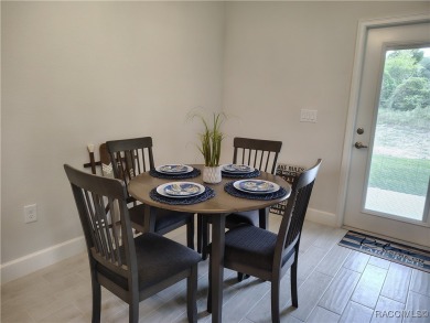 THE SANDHILL TOWNHOUSE - YEARLY BLOWOUT SALES, LOWEST INTEREST on Inverness Golf and Country Club in Florida - for sale on GolfHomes.com, golf home, golf lot