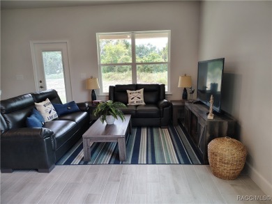 THE SANDHILL TOWNHOUSE - YEARLY BLOWOUT SALES, LOWEST INTEREST on Inverness Golf and Country Club in Florida - for sale on GolfHomes.com, golf home, golf lot