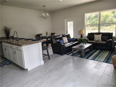 THE SANDHILL TOWNHOUSE - YEARLY BLOWOUT SALES, LOWEST INTEREST on Inverness Golf and Country Club in Florida - for sale on GolfHomes.com, golf home, golf lot