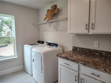 THE SANDHILL TOWNHOUSE - YEARLY BLOWOUT SALES, LOWEST INTEREST on Inverness Golf and Country Club in Florida - for sale on GolfHomes.com, golf home, golf lot