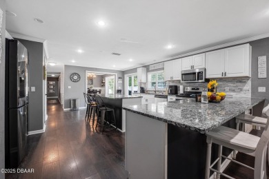 NEVER FLOODED IN ANY HURICANES! Spacious 5BR/3BA home with two on Daytona Beach Golf Club in Florida - for sale on GolfHomes.com, golf home, golf lot