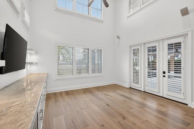 This exquisite home, located on the 15th green of Regatta Bay's on Regatta Bay Golf and Country Club in Florida - for sale on GolfHomes.com, golf home, golf lot