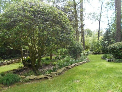 This Traditional home combines timeless features with modern on Tired Creek Golf Course in Georgia - for sale on GolfHomes.com, golf home, golf lot