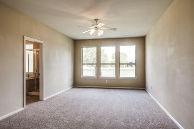 Meticulously maintained 2-story overlooking the second hole of on Lantana Golf Club in Texas - for sale on GolfHomes.com, golf home, golf lot