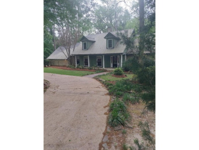 This Traditional home combines timeless features with modern on Tired Creek Golf Course in Georgia - for sale on GolfHomes.com, golf home, golf lot