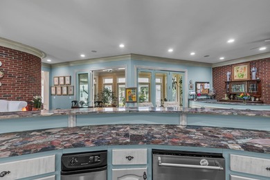 Welcome to an extraordinary executive estate in the heart of the on Highland Oaks Golf Course in Alabama - for sale on GolfHomes.com, golf home, golf lot