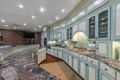 Welcome to an extraordinary executive estate in the heart of the on Highland Oaks Golf Course in Alabama - for sale on GolfHomes.com, golf home, golf lot