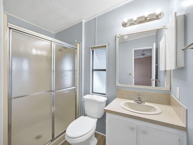 Welcome Home to this charming LAND OWNED 2/2 with a 2020 roof on Spanish Lakes Golf Village in Florida - for sale on GolfHomes.com, golf home, golf lot