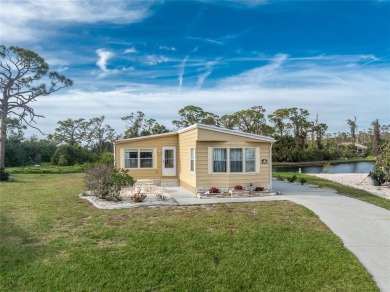 GREAT PRICE on this updated doublewide lakefront FULLY FURNISHED on Lemon Bay Golf Club in Florida - for sale on GolfHomes.com, golf home, golf lot