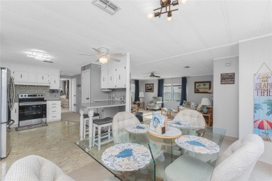 GREAT PRICE on this updated doublewide lakefront FULLY FURNISHED on Lemon Bay Golf Club in Florida - for sale on GolfHomes.com, golf home, golf lot