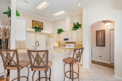 Welcome to this impeccably maintained 4-bedroom, 2-bathroom pool on Spruce Creek Golf Club in Florida - for sale on GolfHomes.com, golf home, golf lot