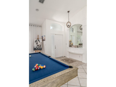 NEW ROOF! This spacious home with updated, kitchen and bathrooms on Santa Lucia River Club in Florida - for sale on GolfHomes.com, golf home, golf lot