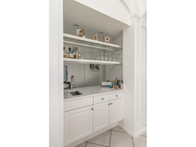 NEW ROOF! This spacious home with updated, kitchen and bathrooms on Santa Lucia River Club in Florida - for sale on GolfHomes.com, golf home, golf lot