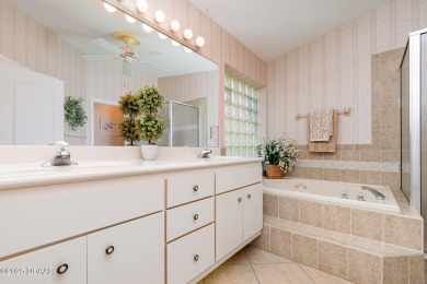 Welcome to this impeccably maintained 4-bedroom, 2-bathroom pool on Spruce Creek Golf Club in Florida - for sale on GolfHomes.com, golf home, golf lot
