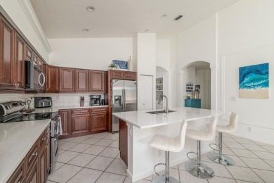 NEW ROOF! This spacious home with updated, kitchen and bathrooms on Santa Lucia River Club in Florida - for sale on GolfHomes.com, golf home, golf lot