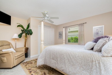 Welcome to this impeccably maintained 4-bedroom, 2-bathroom pool on Spruce Creek Golf Club in Florida - for sale on GolfHomes.com, golf home, golf lot