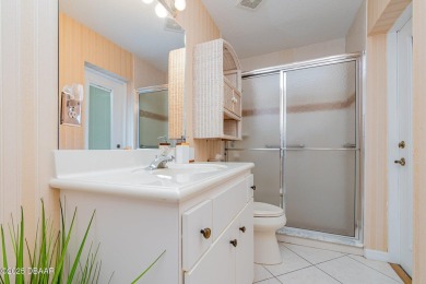 Welcome to this impeccably maintained 4-bedroom, 2-bathroom pool on Spruce Creek Golf Club in Florida - for sale on GolfHomes.com, golf home, golf lot