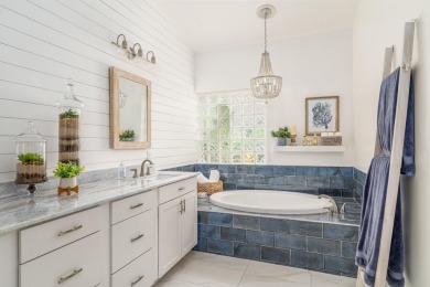 NEW ROOF! This spacious home with updated, kitchen and bathrooms on Santa Lucia River Club in Florida - for sale on GolfHomes.com, golf home, golf lot