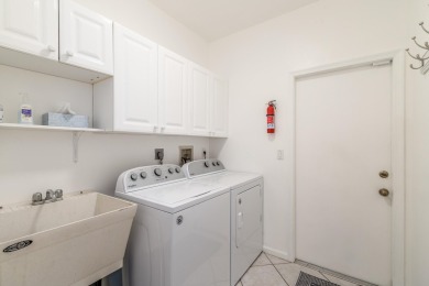 NEW ROOF! This spacious home with updated, kitchen and bathrooms on Santa Lucia River Club in Florida - for sale on GolfHomes.com, golf home, golf lot