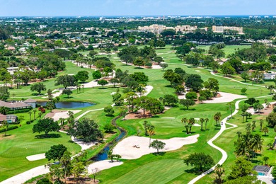 Prime Opportunity to Renovate on Premier Golf on Atlantis Golf Club in Florida - for sale on GolfHomes.com, golf home, golf lot