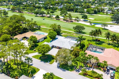 Prime Opportunity to Renovate on Premier Golf on Atlantis Golf Club in Florida - for sale on GolfHomes.com, golf home, golf lot