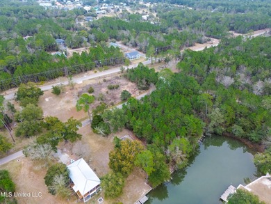 Your Gulf Coast Escape Awaits! Imagine waking up to the sound of on Pass Christian Isles Golf Club in Mississippi - for sale on GolfHomes.com, golf home, golf lot